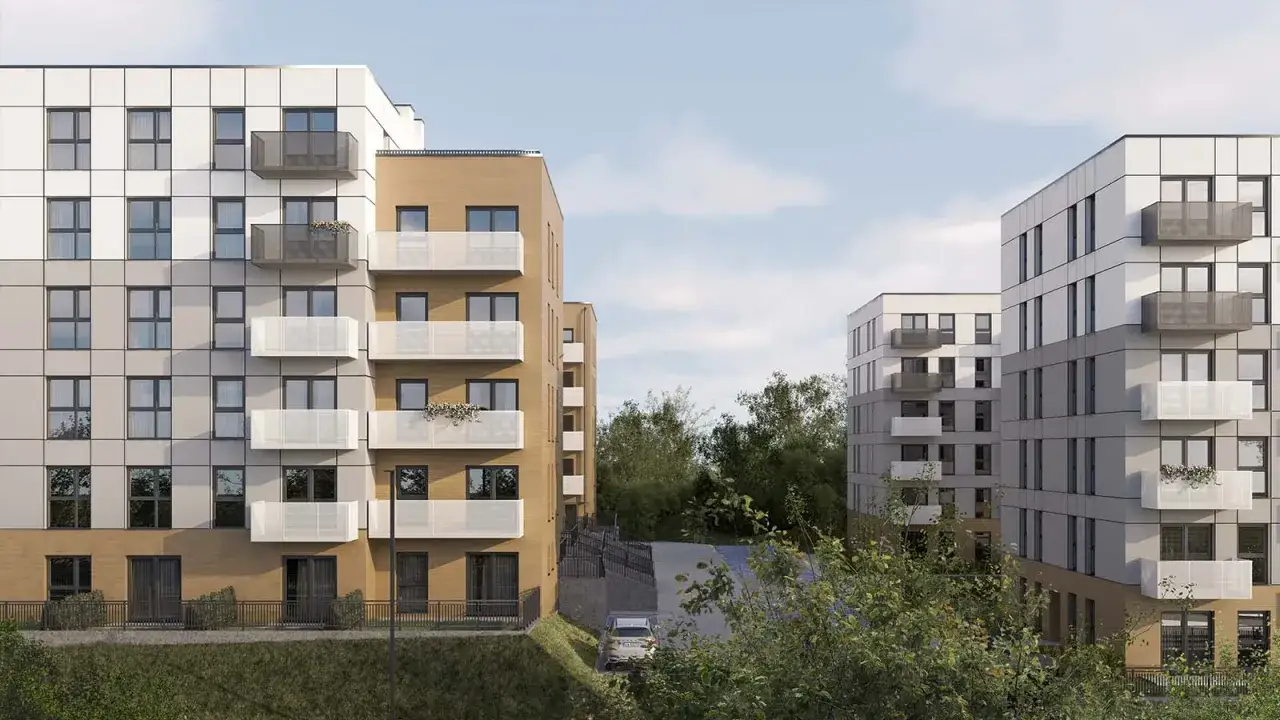 Nowoczesne bloki mieszkalne Murapol Sosnowiec z białymi balkonami i drewnianymi elementami fasady, otoczone zielenią.