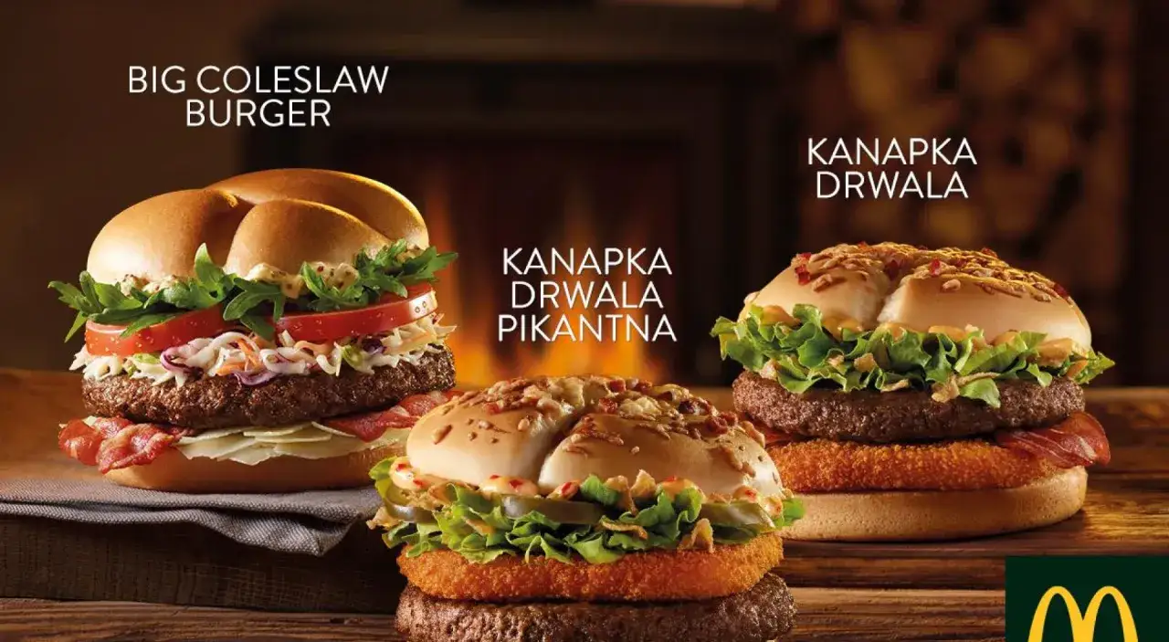 Kanapka Drwala: soczysty kotlet, chrupiący boczek, ser, świeże warzywa i sos. Idealny wybór dla miłośników burgerów.