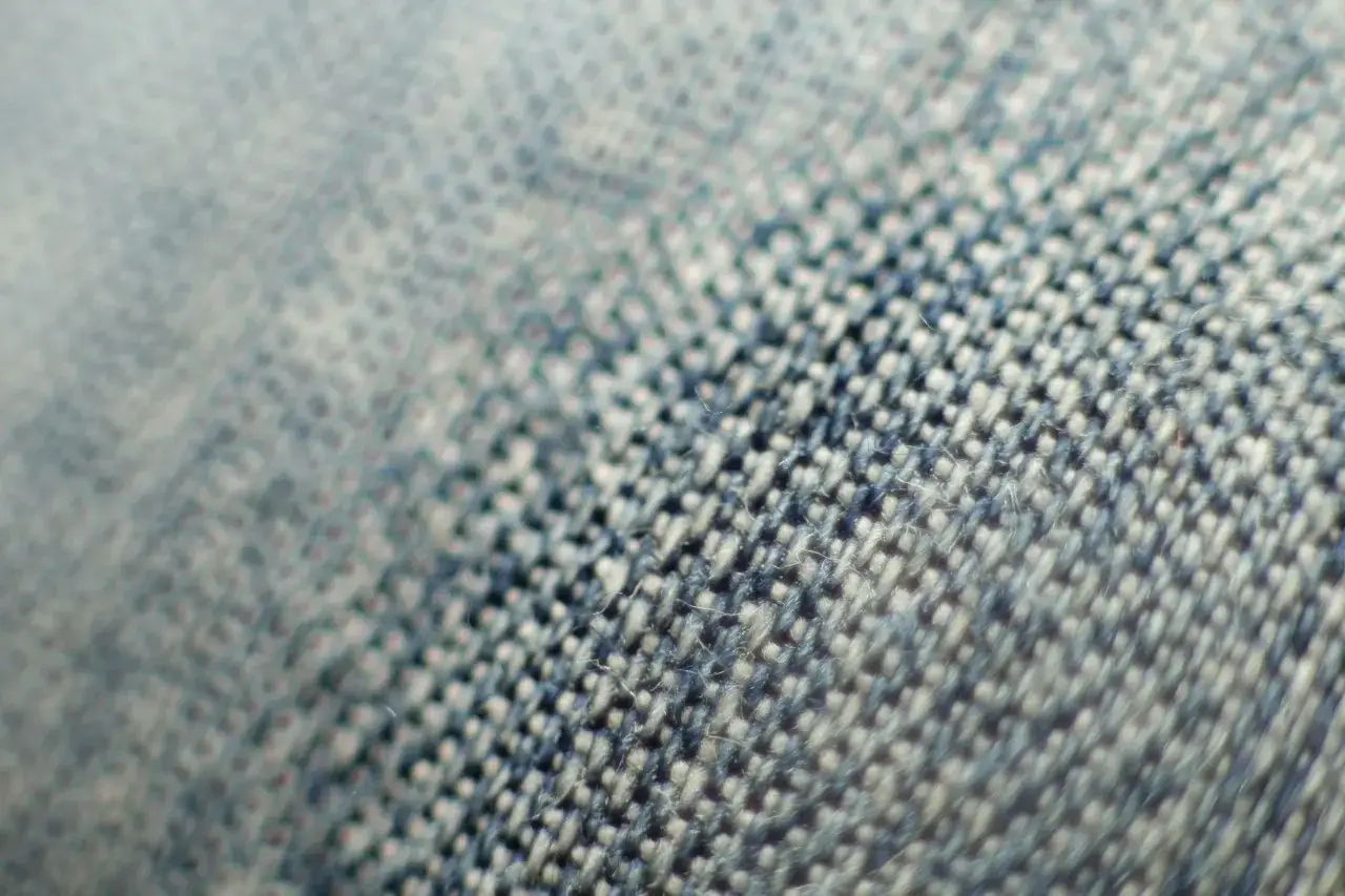 Makroaufnahme von Denim-Stoff. Die Frage 