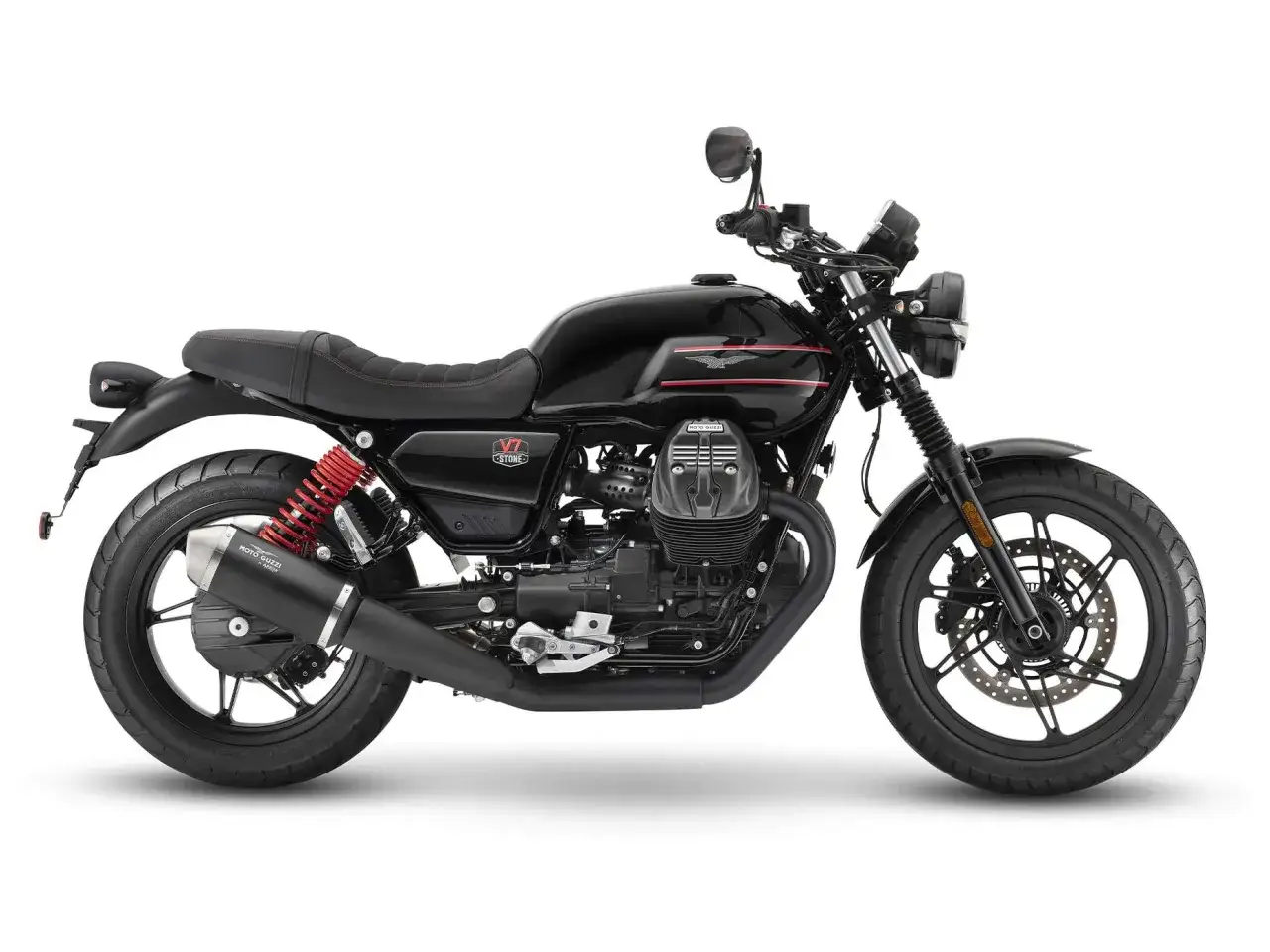 Moto Guzzi V7 Special negra, con detalles rojos en el asiento y amortiguadores. Un clásico moderno listo para la carretera.