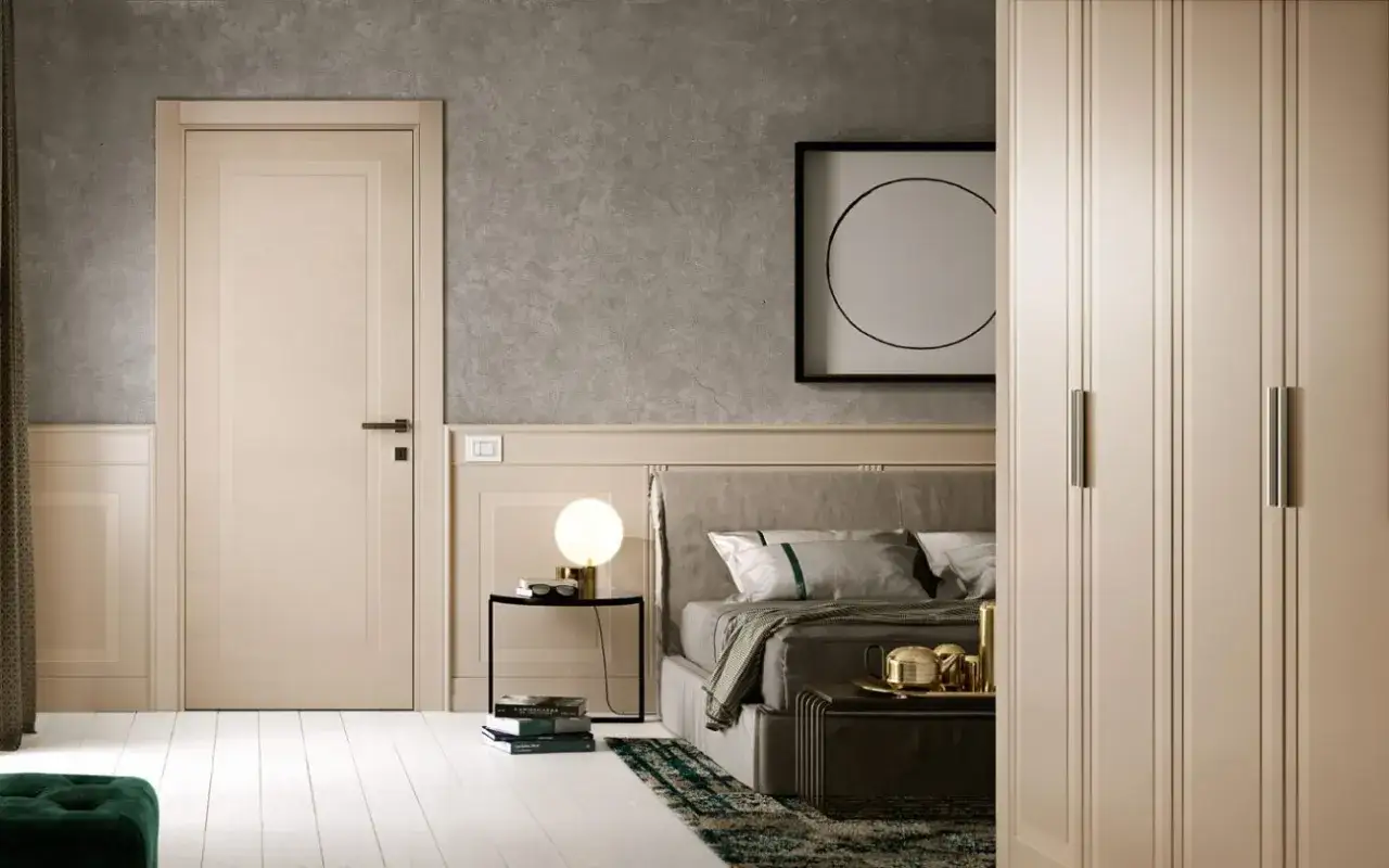 Porte intérieure beige clair, une question de quelle couleur choisir pour les portes intérieures. Chambre moderne avec lit douillet et armoire assortie.