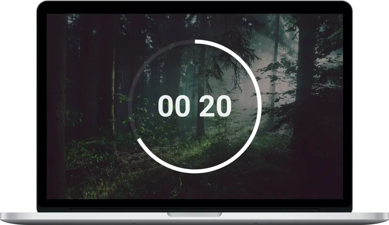 Na ekranie laptopa widoczny jest tajemniczy las, a na nim okrągły timer z napisem