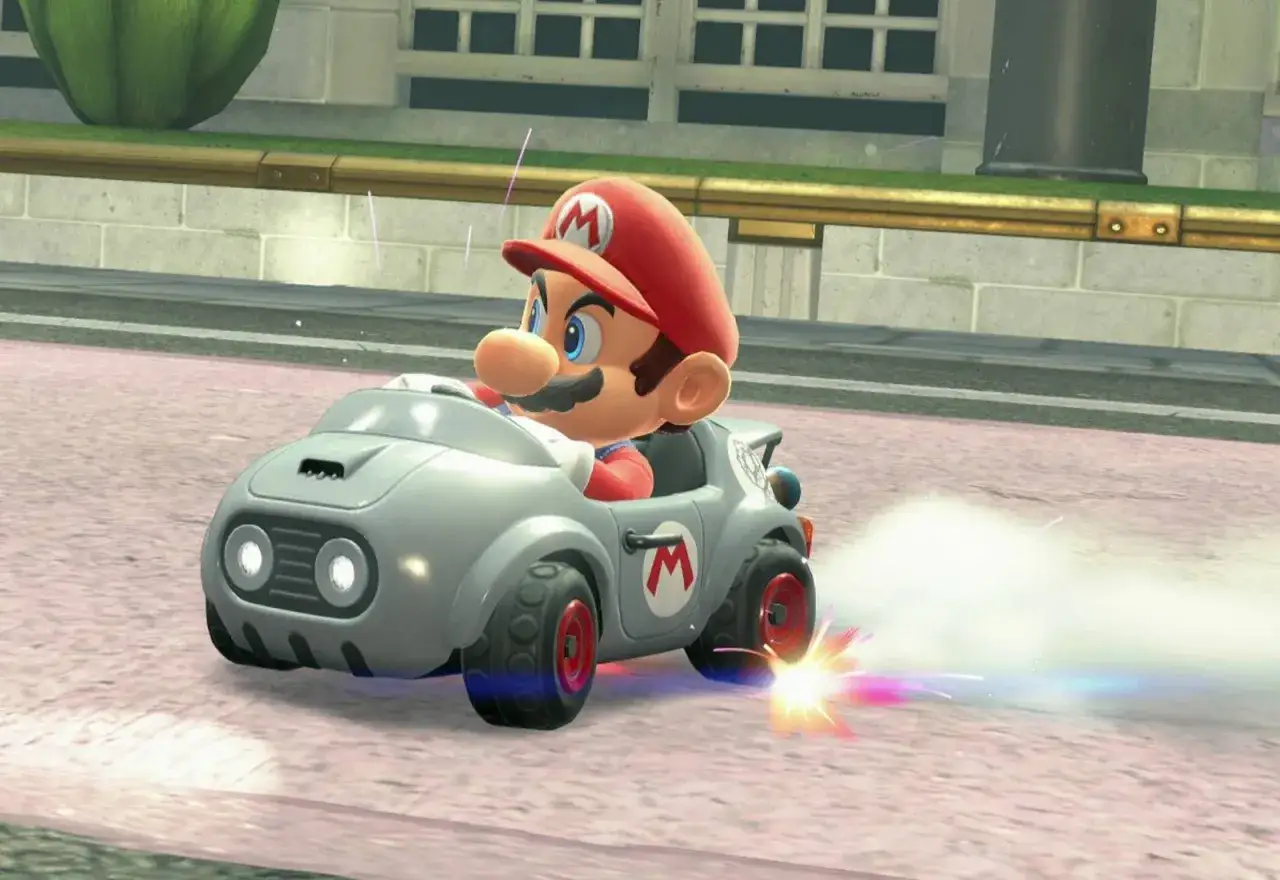 Mario en su kart plateado, derrapando y lanzando chispas. &iexcl;Un truco de Mario Kart 8 para ganar la carrera!