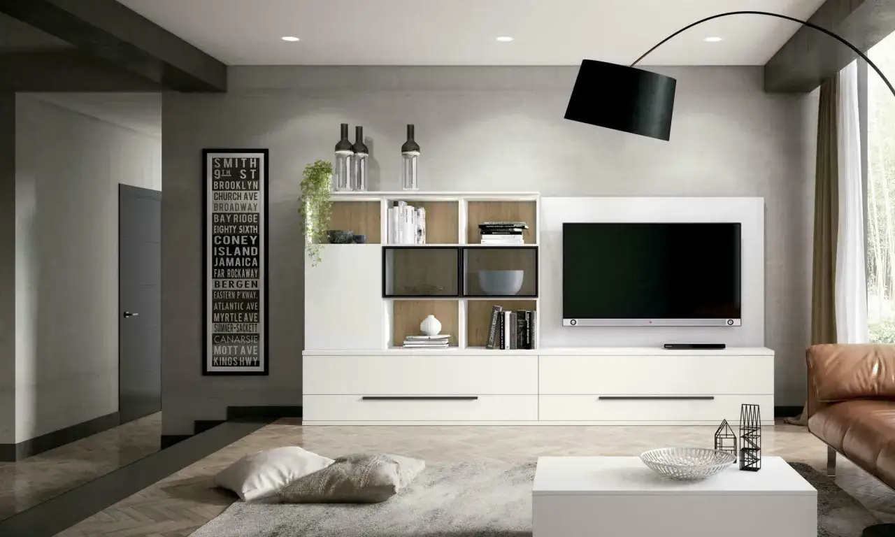 Estantería blanca moderna con TV, ideal para salones pequeños. Los colores neutros y el diseño funcional amplían visualmente el espacio.