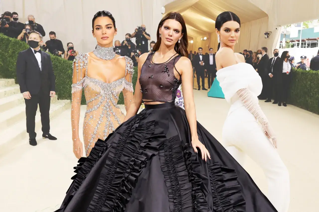 Kendall Jenner stuns in three distinct Met Gala looks, showcasing her fashion prowess.