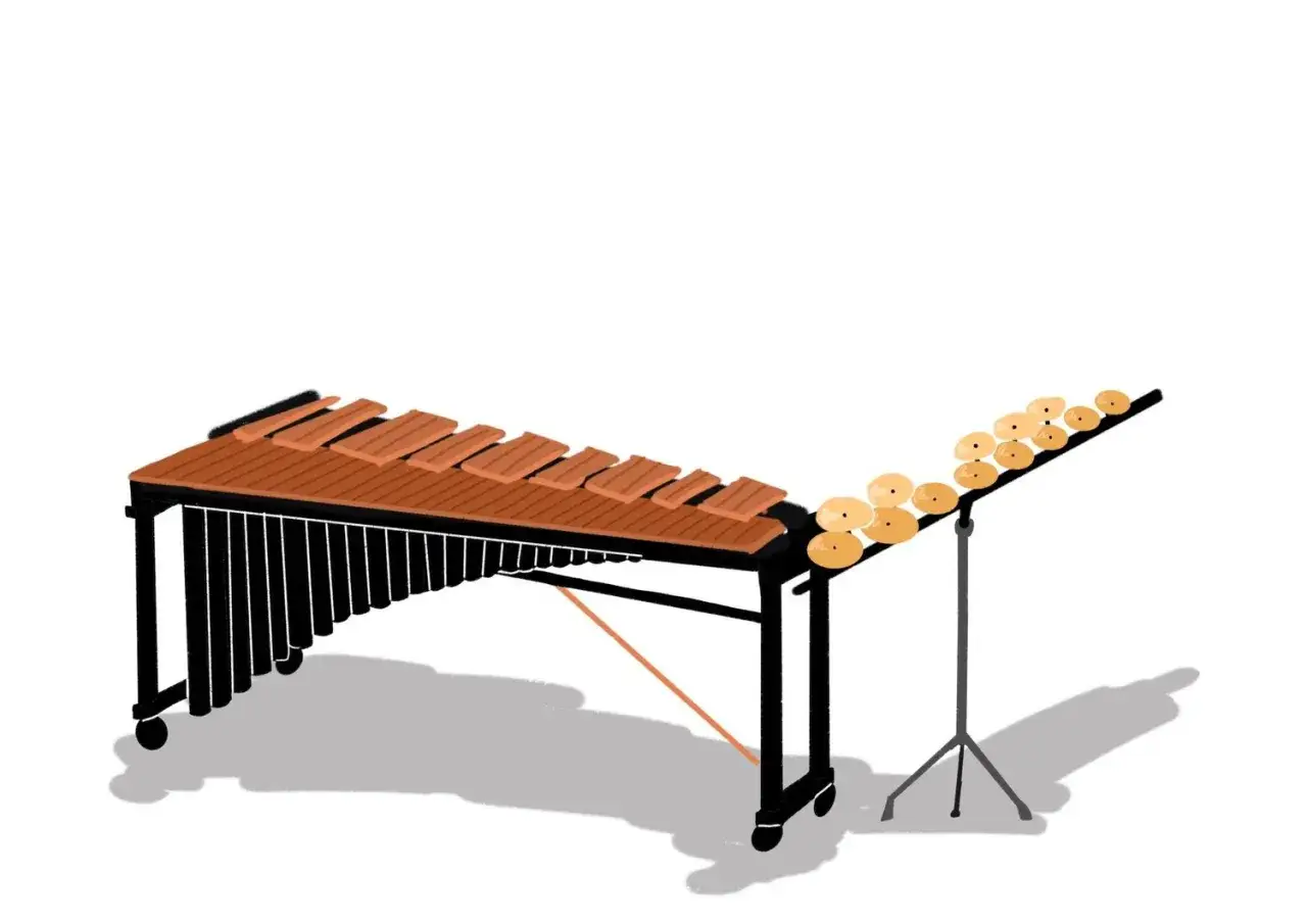 Instrumenty perkusyjne melodyczne: marimba i talerze na statywie. Gotowe do tworzenia pięknych dźwięków.