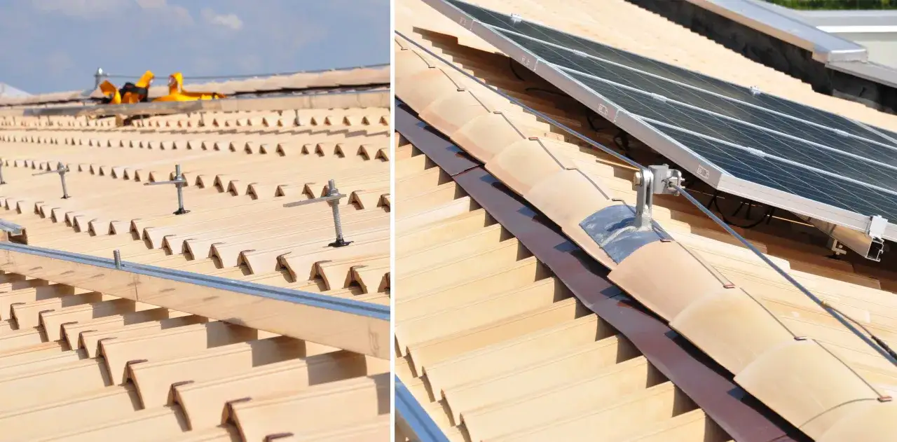 Installazione di pannelli solari su tetti con tegole. Strutture metalliche e cavi pronti per l'energia pulita.