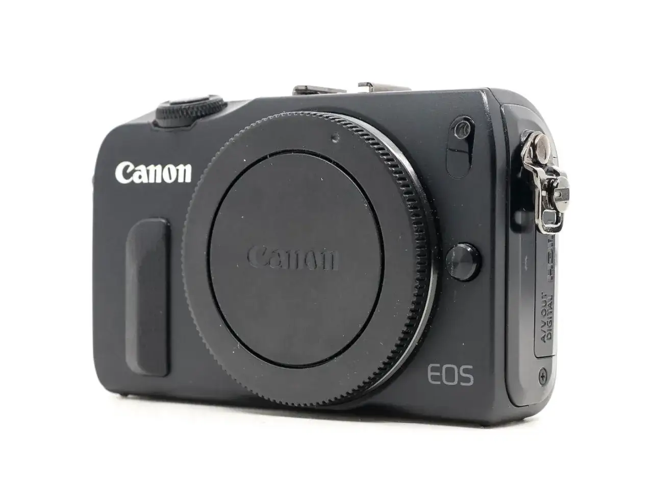 Macchina fotografica nera Canon EOS M, compatta e leggera, pronta per catturare ogni momento.