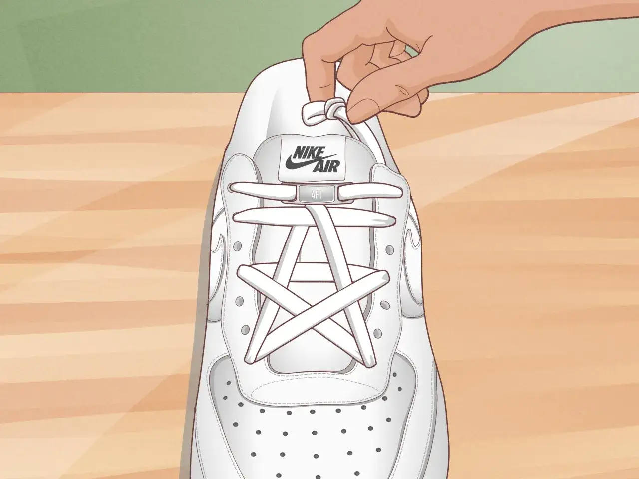 Eine Hand bindet die Schn&uuml;rsenkel eines wei&szlig;en Air Force 1 Sneakers.