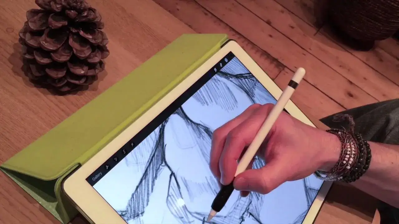 Digital artist drawing on iPad Pro with Apple Pencil