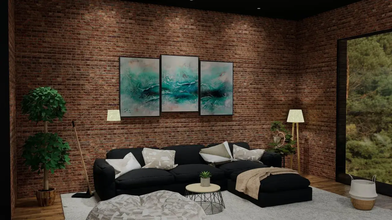 Acogedor sal&oacute;n con pared de ladrillo, sof&aacute; negro, arte abstracto y gran ventanal con vistas al bosque.