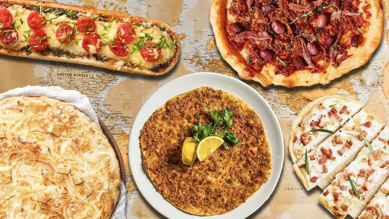 Kulinarna podróż przez pizze świata: od francuskiego tartiflette po włoską pizzę z anchois i oliwkami.