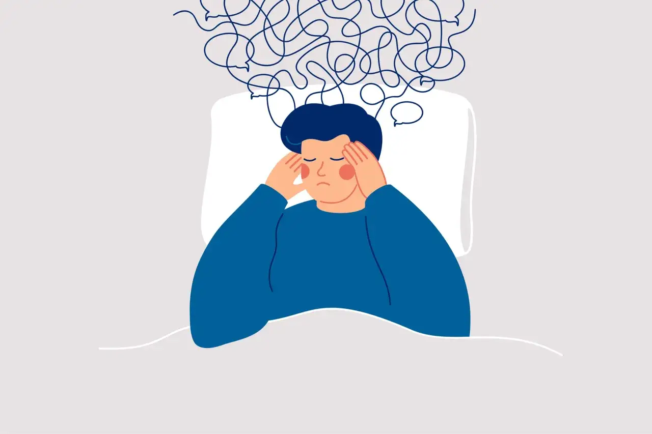 Persona a letto con le mani sulle tempie, circondata da grovigli di linee che simboleggiano il significato di pensiero intrusivo.