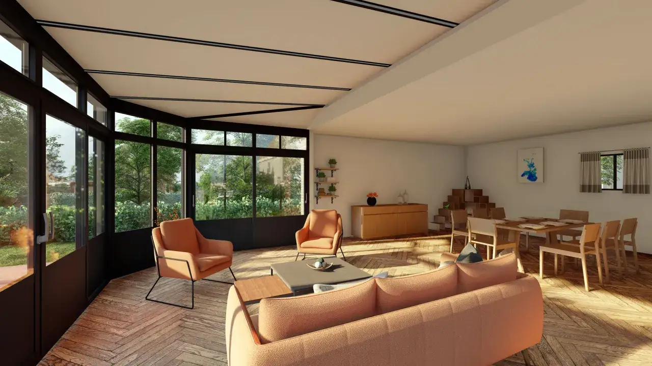 Salon lumineux avec de grandes baies vitrées donnant sur un jardin luxuriant. Mobilier moderne et parquet en chevrons. Un **bâtiment sans permis de construire** qui invite à la détente.