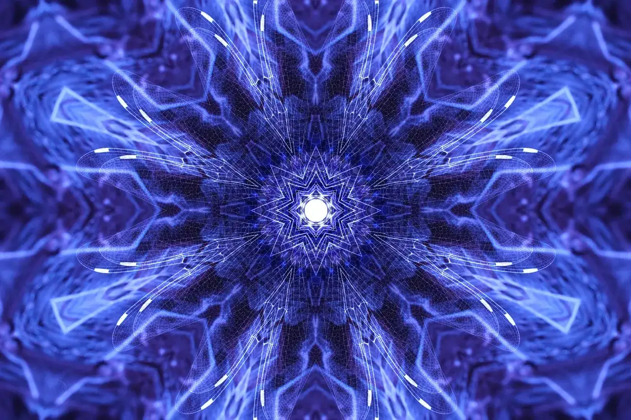 Un mandala de luz azul vibrante, con patrones que evocan alas de lib&eacute;lula, simbolizando la conexi&oacute;n cu&aacute;ntica espiritual y la energ&iacute;a universal.