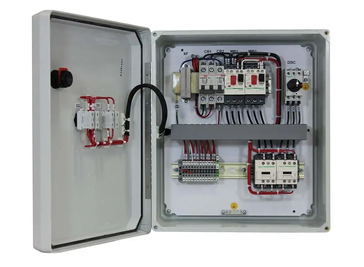 Inside an open electrical panel, a motor circuit protector and circuit breakers are visible, alongside contactors and wiring.
