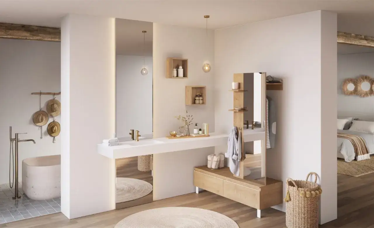 &Eacute;l&eacute;gante salle de bain parentale avec baignoire, double vasque, rangements en bois et vue sur la chambre.