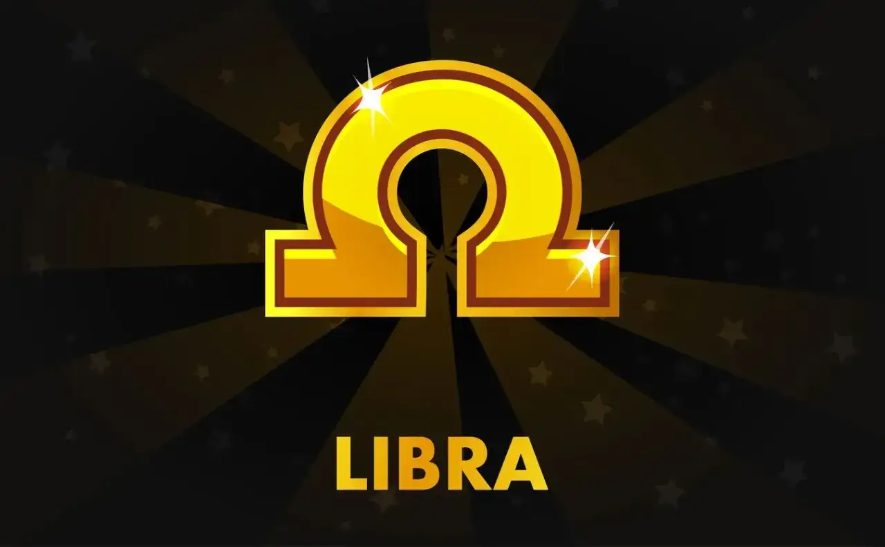 Złoty symbol Wagi i napis LIBRA na tle gwiazd. Dziś horoskop na dziś waga miłosny zapowiada harmonię.