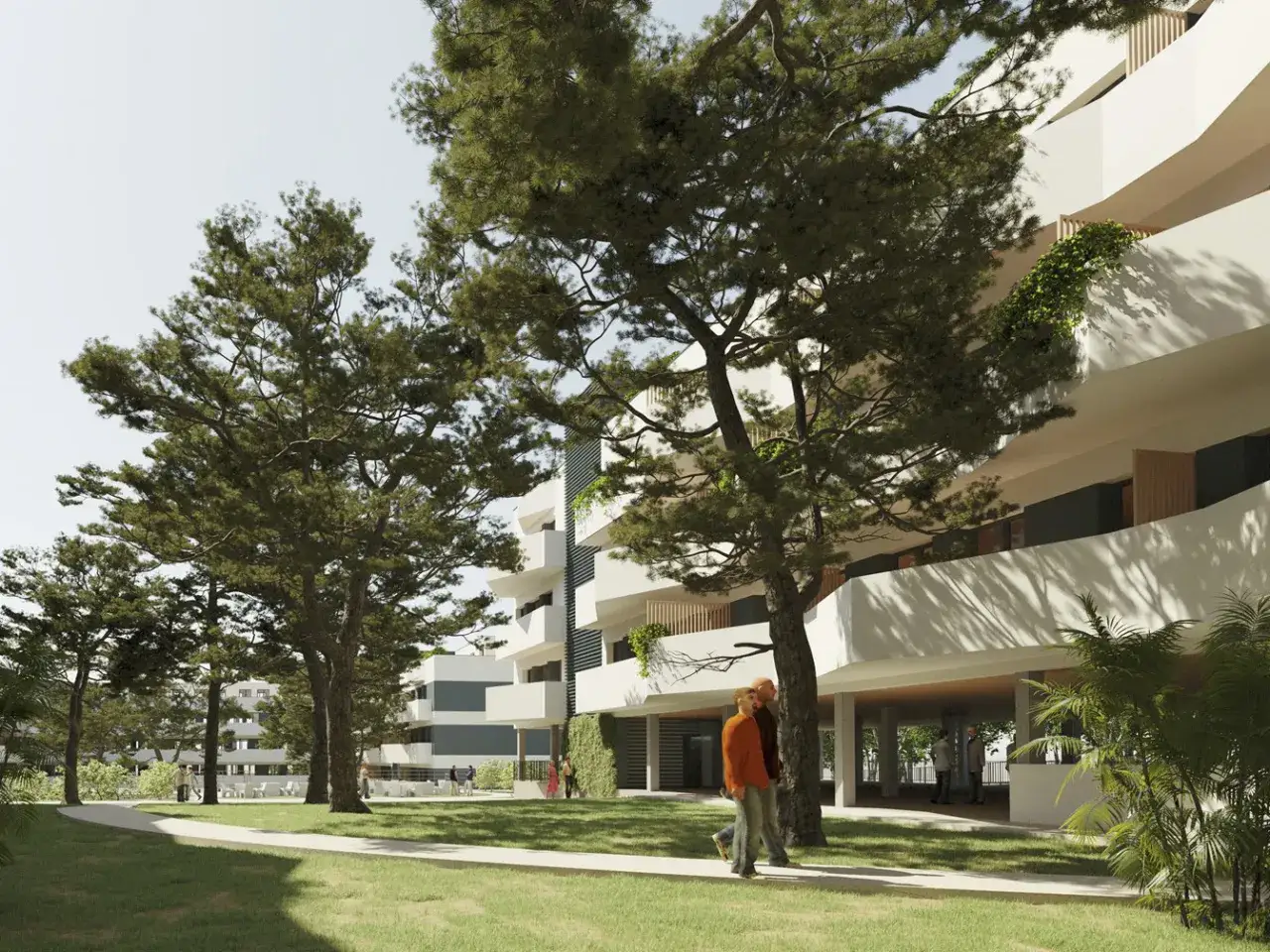 Un futuro moderno para vivir en Boadilla del Monte. Edificios blancos con balcones curvos, rodeados de pinos y c&eacute;sped verde.