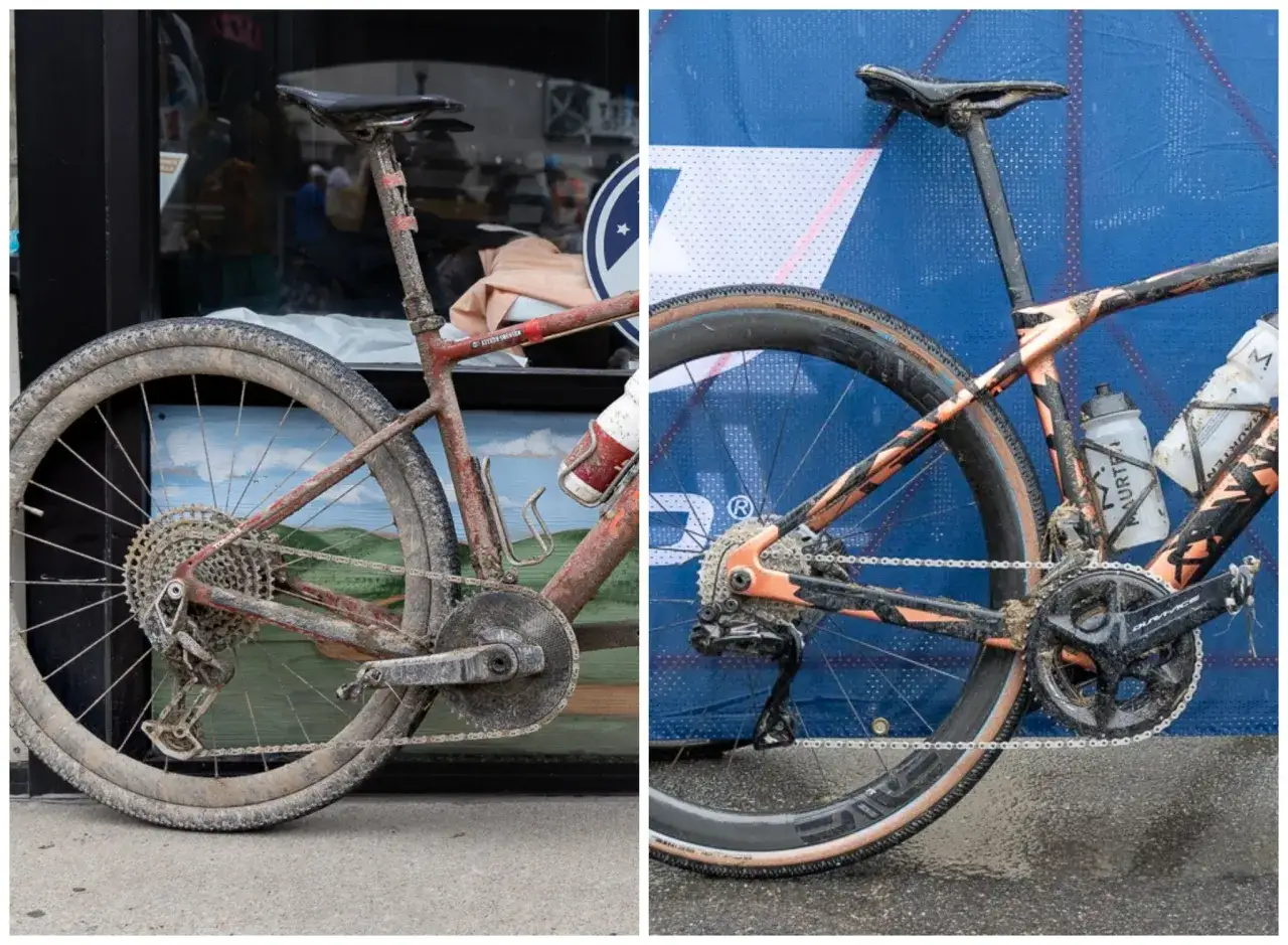 Two muddy bikes, one red and one orange, showcase their robust gravel drivetrain components after a challenging ride.