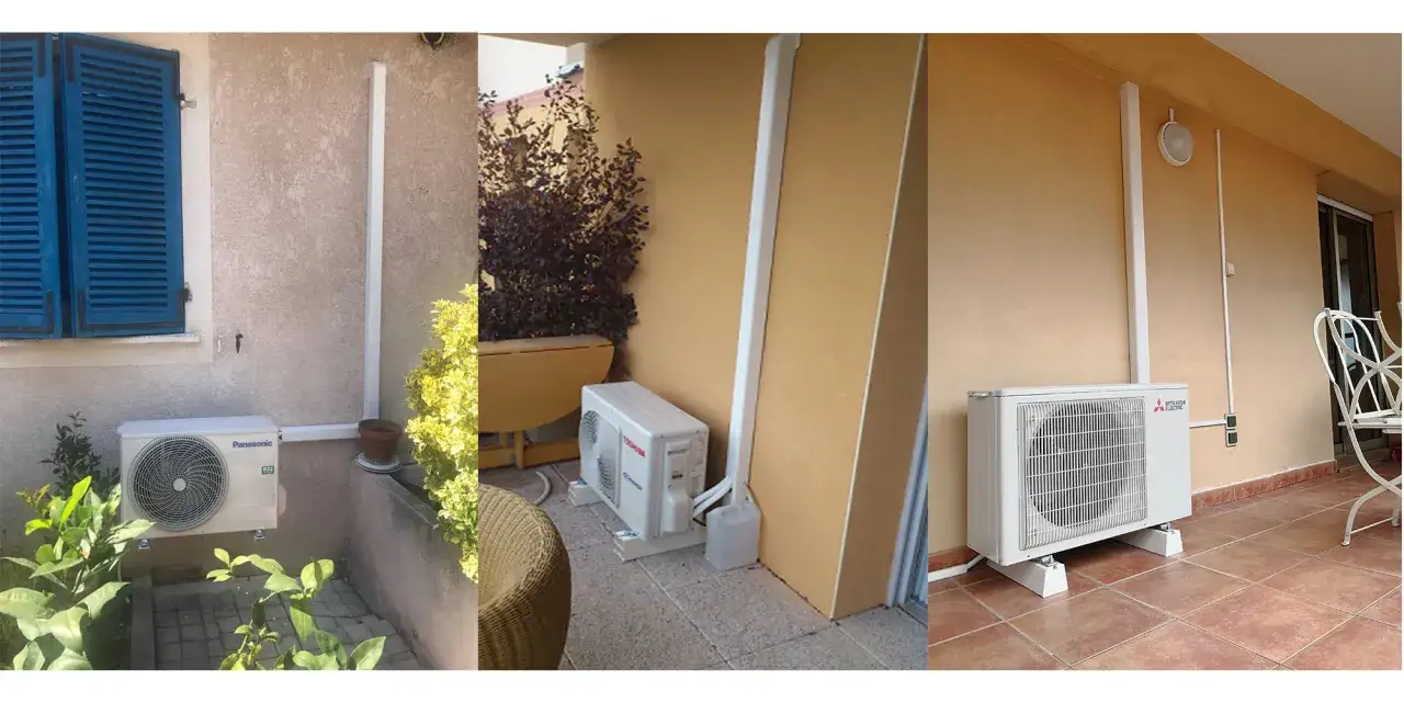 Trois unit&eacute;s ext&eacute;rieures de climatisation split sont visibles, install&eacute;es sur des murs ext&eacute;rieurs de maisons.