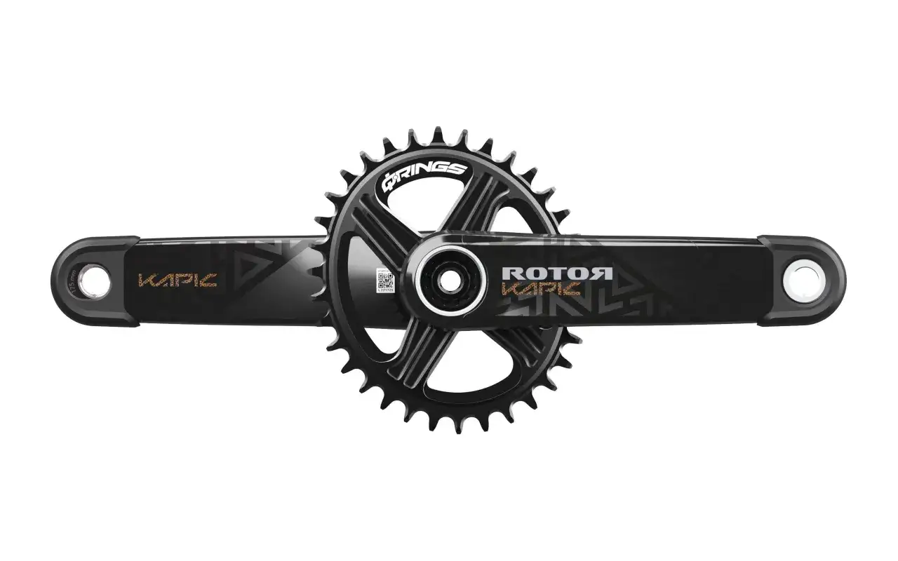 A black 1x drivetrain with a Rotor Q-Ring and Kapic crank arms. The chainring features the