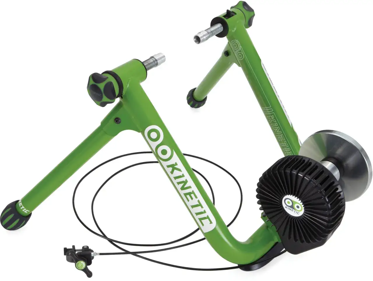 Two green Kinetic magnetic resistance trainers with black accents and a remote resistance adjuster.