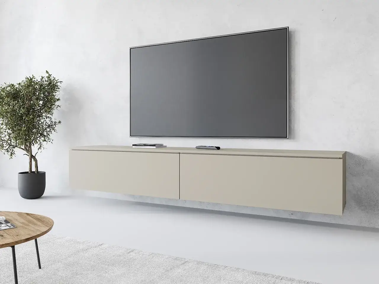 Nowoczesna, wisząca komoda pod telewizor w neutralnym kolorze, z minimalistycznym designem.