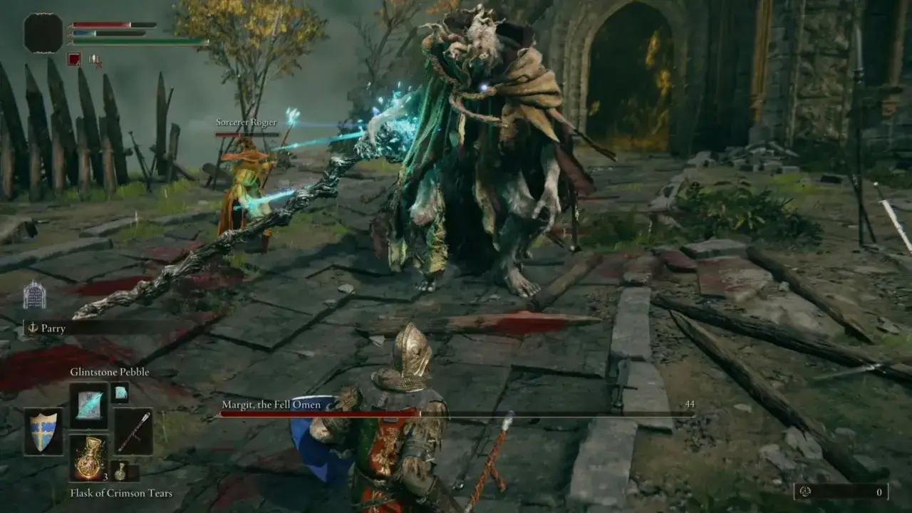 Un jugador se enfrenta a Margit, el Omen Ca&iacute;do, uno de los jefes de Elden Ring. Sorcerer Rogier ayuda en la batalla.