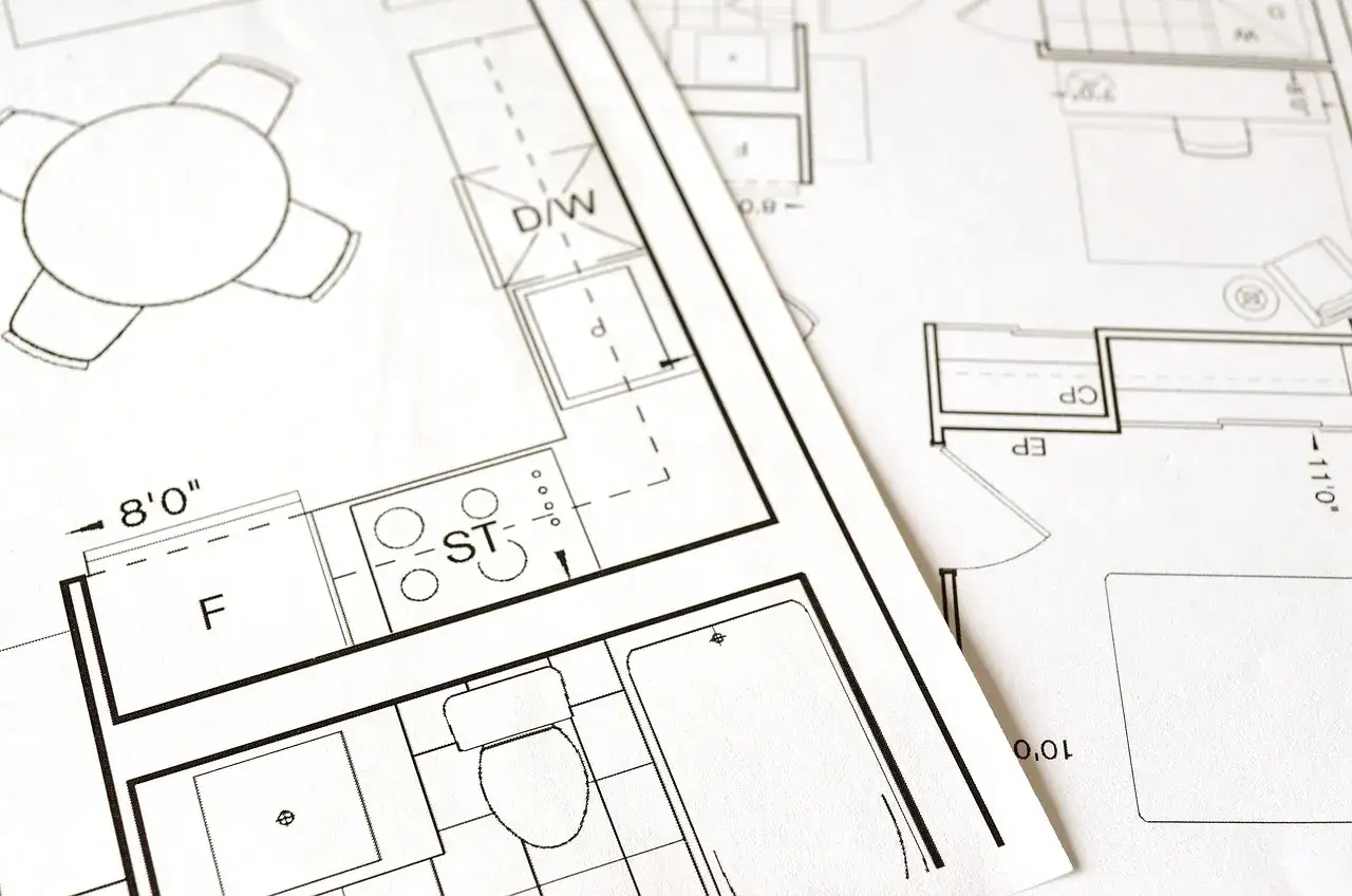 Plan mieszkania z zaznaczonymi pomieszczeniami: kuchnią (ST, F, D/W), łazienką i salonem. To adaptacja projektu budowlanego.