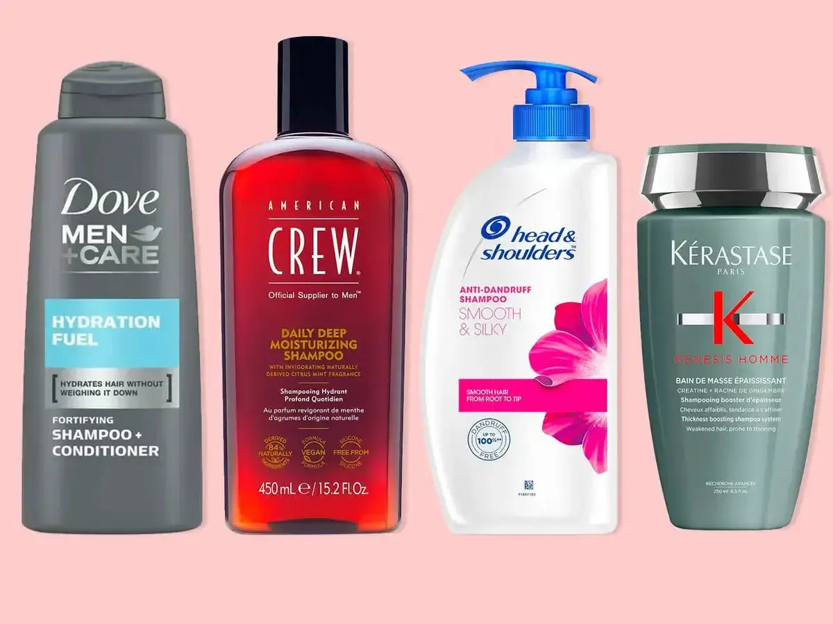 Vier Shampooflaschen f&uuml;r M&auml;nner: Dove, American Crew, Head & Shoulders und K&eacute;rastase. Ideal f&uuml;r strohiges Haar, Mann.