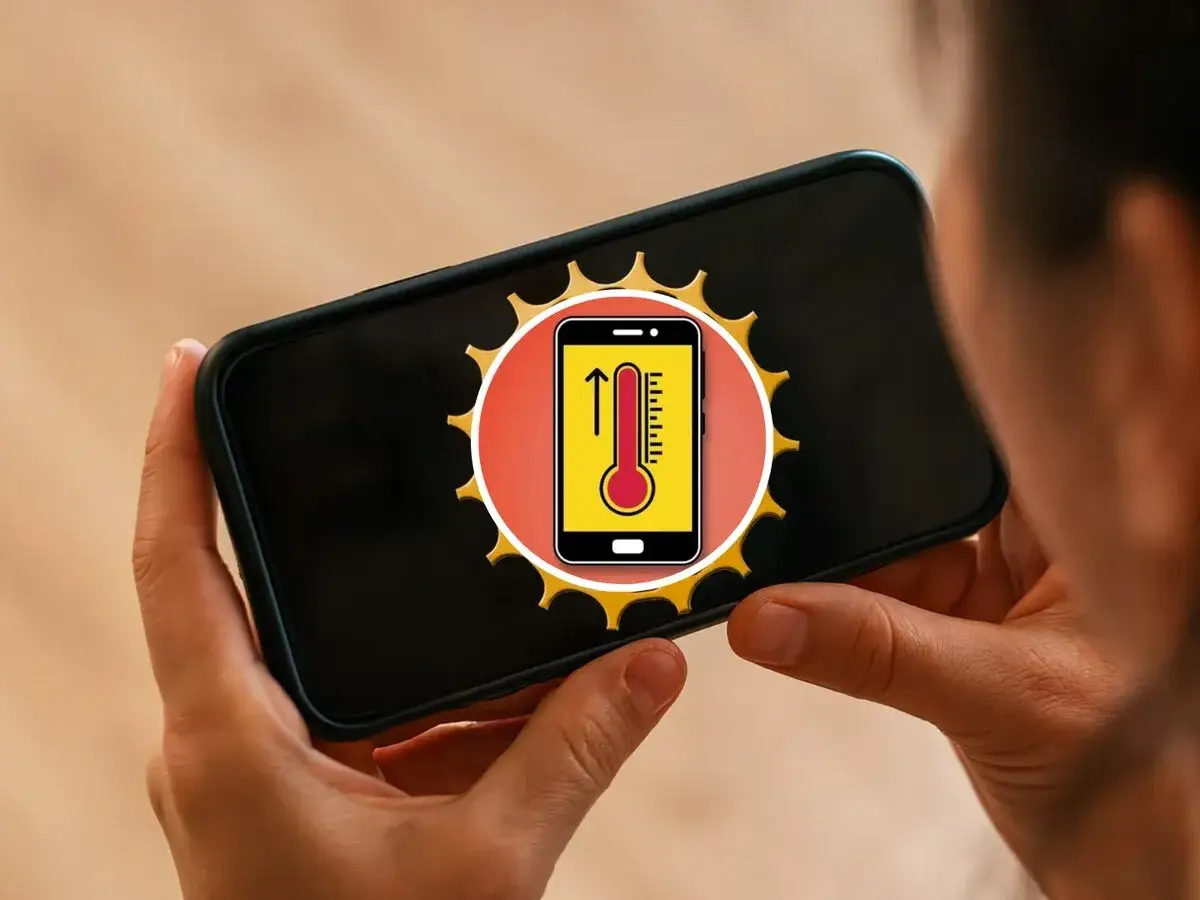 Tel&eacute;fono con term&oacute;metro subiendo. &iexcl;Hora de enfriar m&oacute;vil!