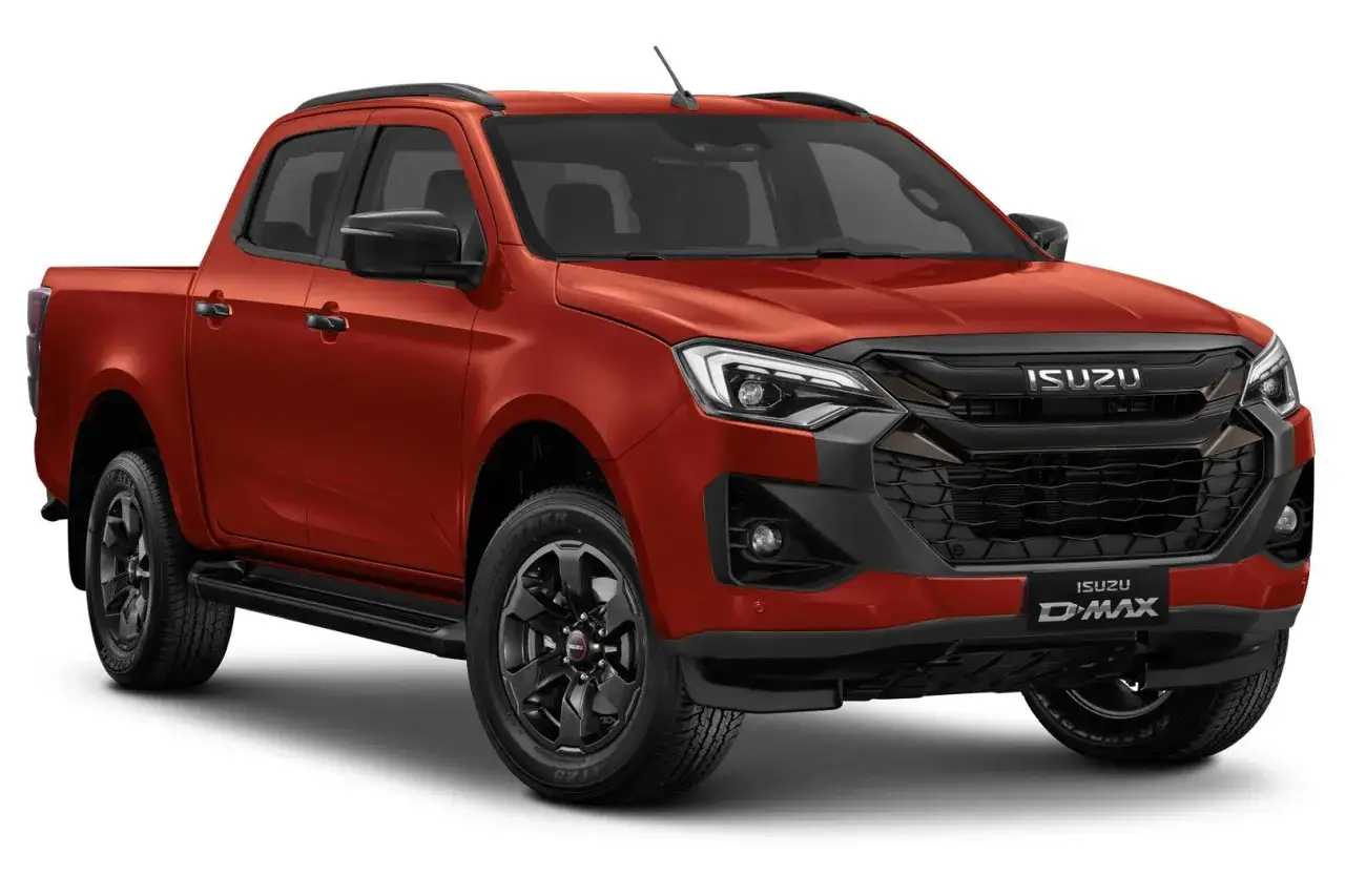 Pomarańczowy Isuzu D-Max z czarnymi dodatkami, gotowy na każdą przygodę.