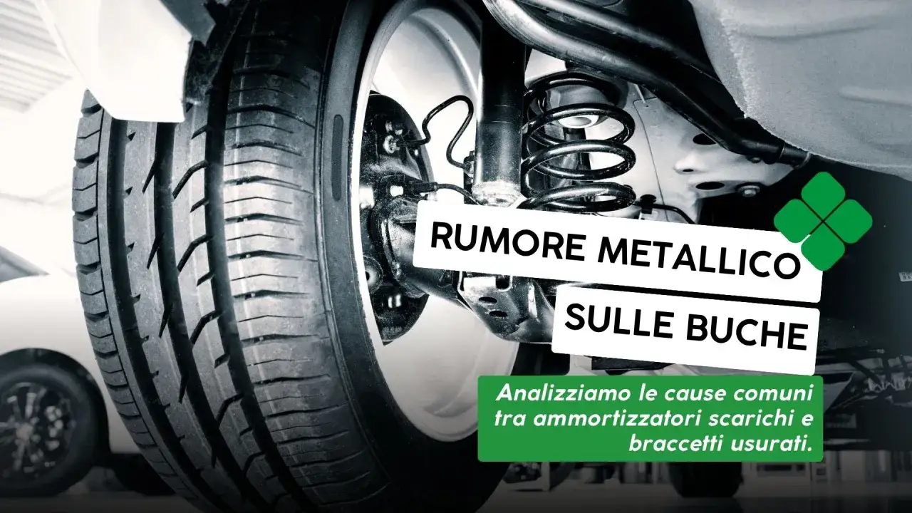 Dettaglio della sospensione di un'auto, con testo che parla di 