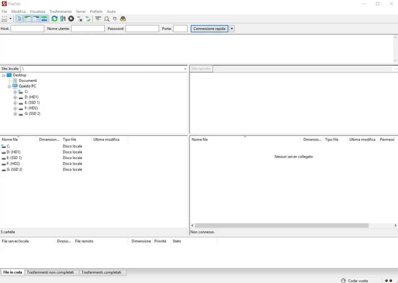 Interfejs FileZilla, programu do transferu plik&oacute;w. Widok lokalnych dysk&oacute;w i brak połączenia z serwerem zdalnym. FileZilla co to? To narzędzie do zarządzania plikami.