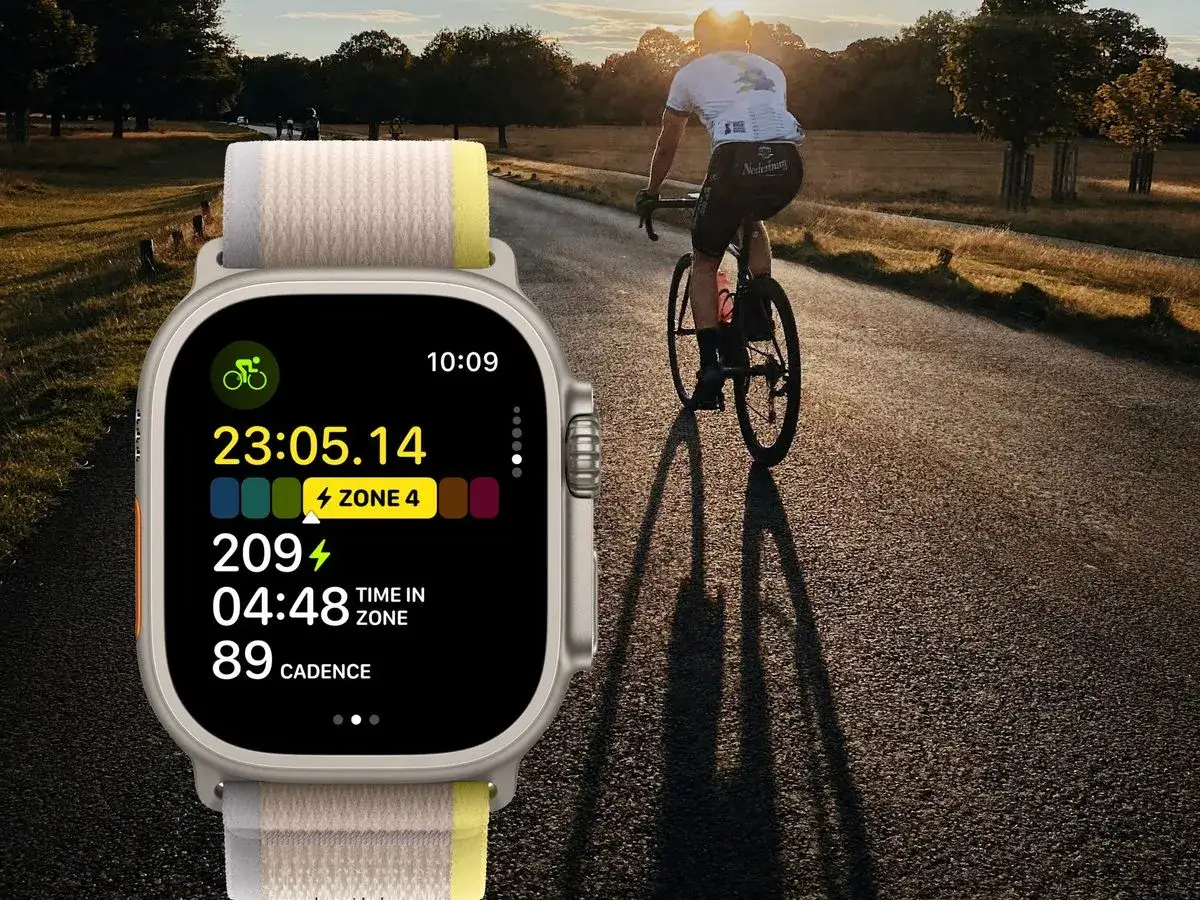 Apple Watch Ultra displays cycling metrics like heart rate and cadence during a ride, showing