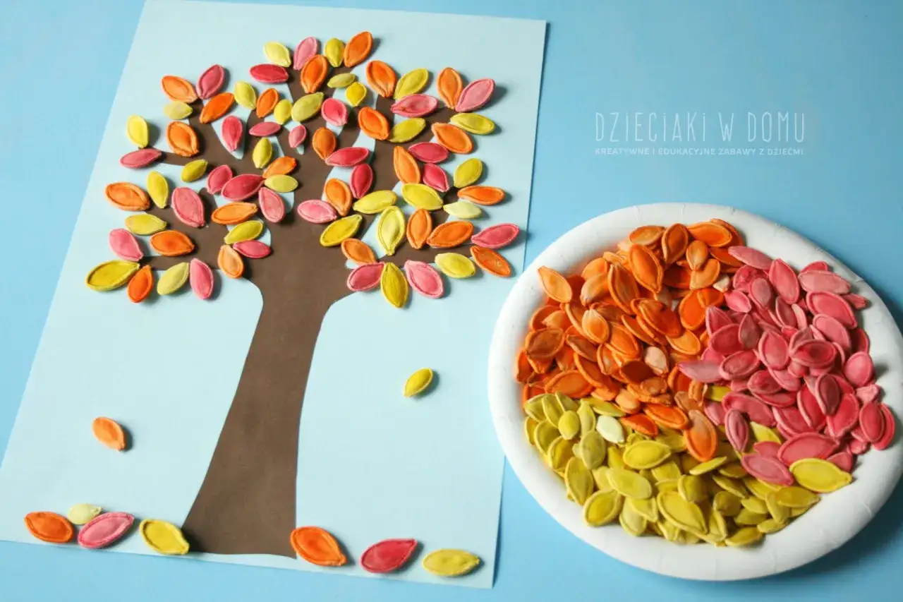 Jesienne prace plastyczne: drzewo z kolorowych pestek dyni. Inspiracja na kreatywne zabawy z dziećmi.