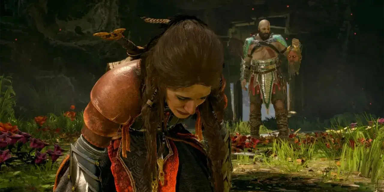 Freya, sumida en la tristeza, observa a Kratos con la cabeza de Baldur. La paz perdida de Freya se refleja en su rostro.
