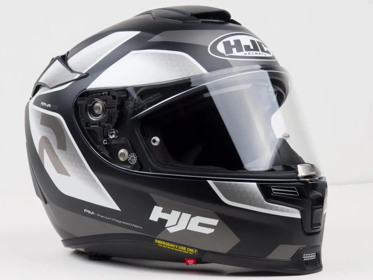 Kask motocyklowy HJC RPHA 70 w czarno-biało-szarej kolorystyce z widocznym logo HJC i napisem 