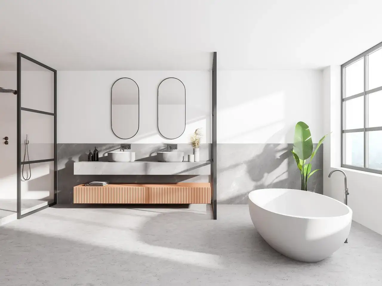 Salle de bain moderne avec douche sans carrelage, double vasque, baignoire &icirc;lot et grande fen&ecirc;tre.