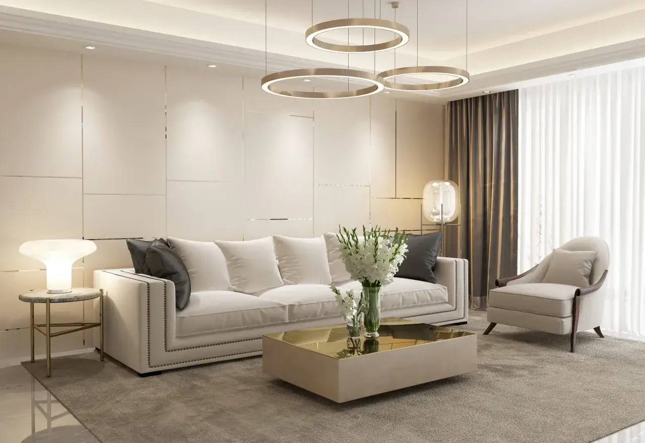 Elegancki salon w stylu nowojorskim z białą sofą, złotymi lampami i nowoczesnym stolikiem kawowym.