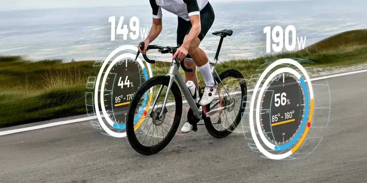 Cyclist pushing to max power, with 149W and 190W readings displayed. Data shows 44% and 56% effort levels.