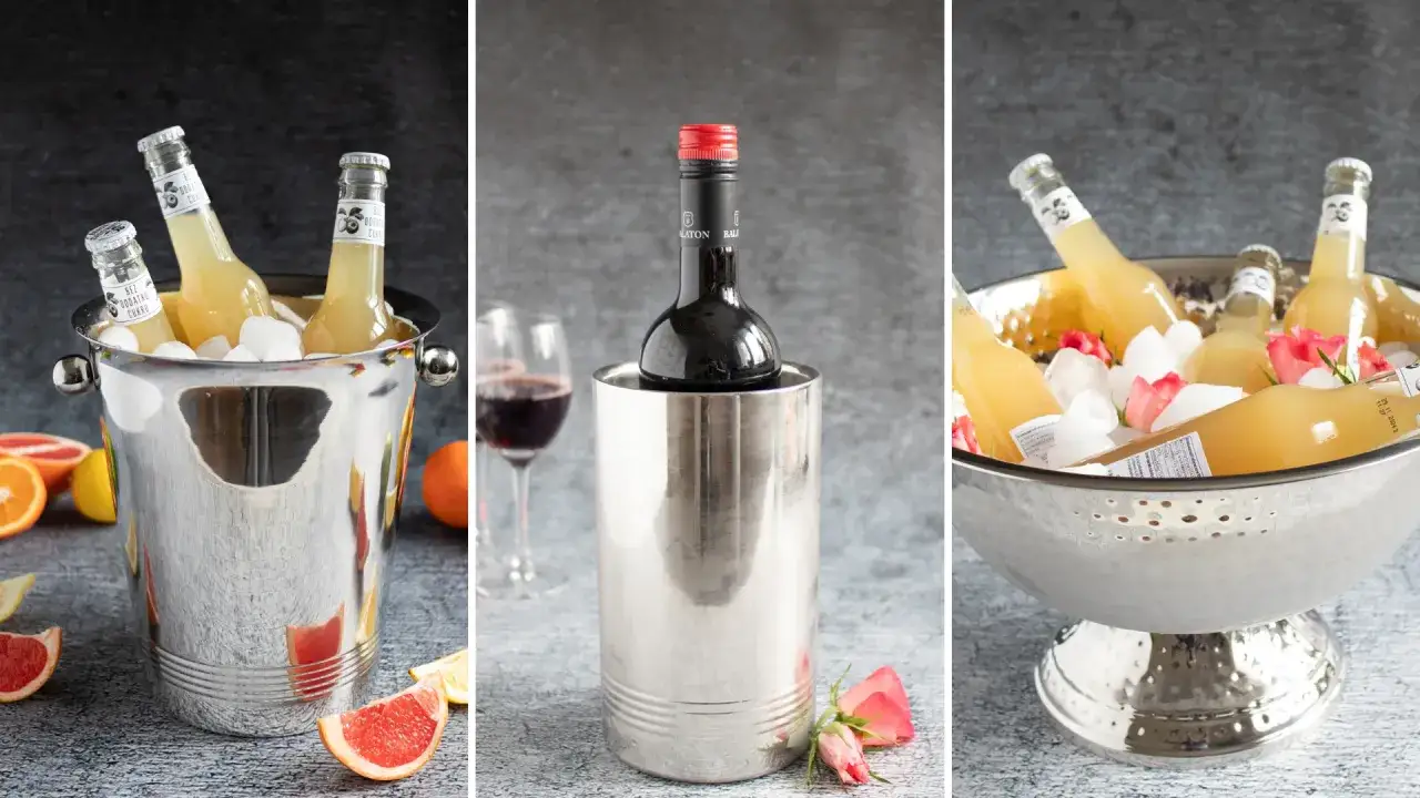 Elegancki cooler do lodu z butelkami napoju i winem. W tle owoce cytrusowe i róże.