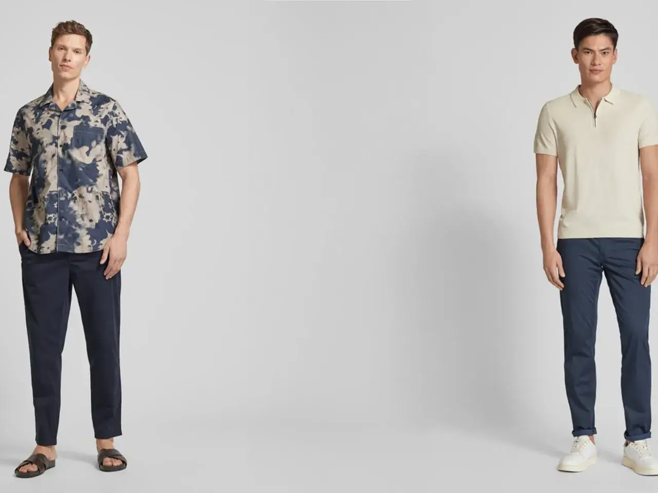 Zwei M&auml;nner pr&auml;sentieren Outfits: links mit gemustertem Hemd und dunklen Hosen, rechts mit hellem Poloshirt und blauen Chino-Hosen.