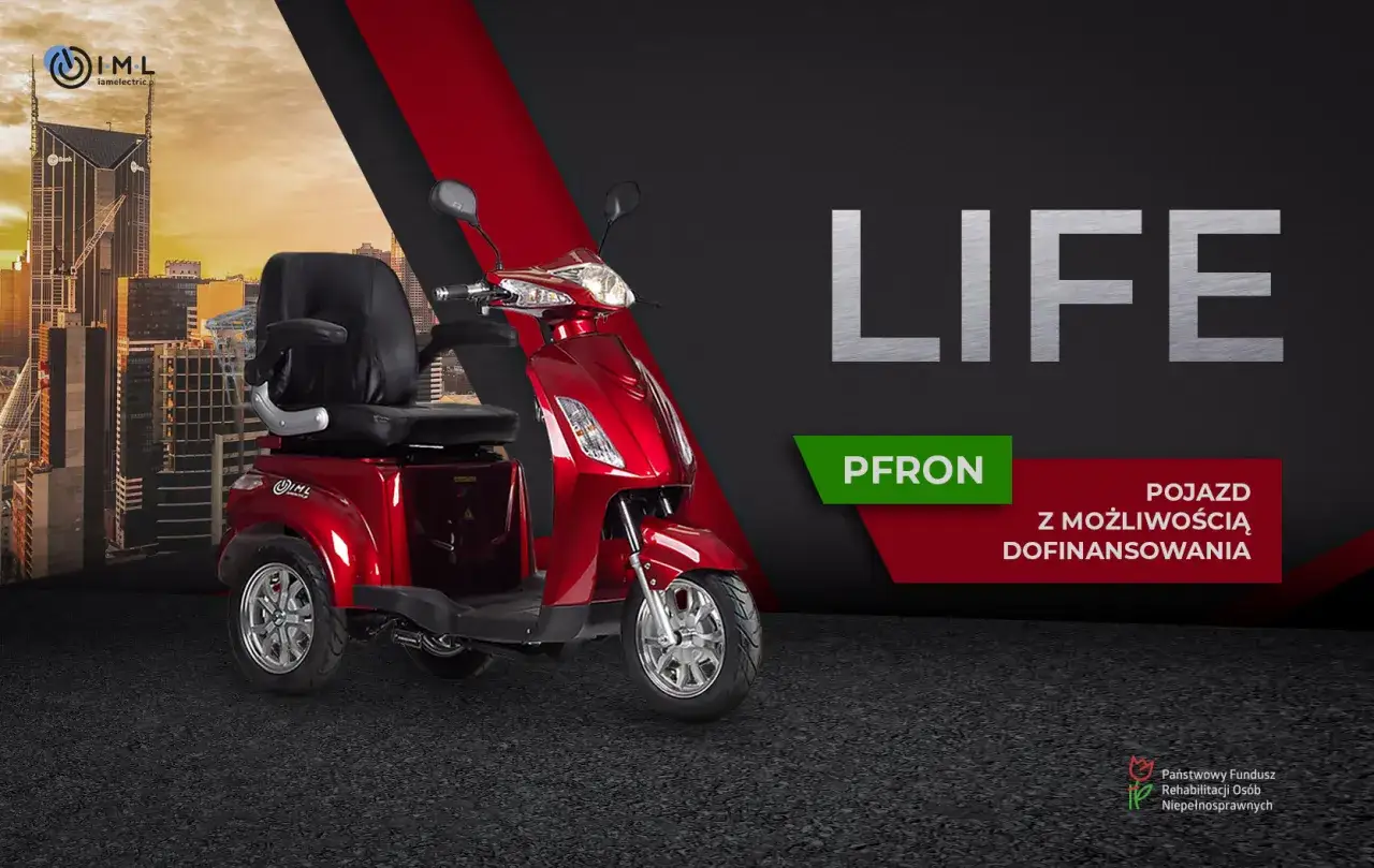 Czerwony skuter elektryczny LIFE z wygodnym siedziskiem, idealny dla osób szukających mobilności. Pojazd z możliwością dofinansowania z PFRON.