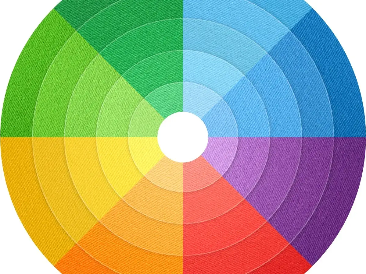 Un c&iacute;rculo cromatico con degradados de colores vibrantes, desde el verde hasta el rojo, pasando por azules y amarillos.