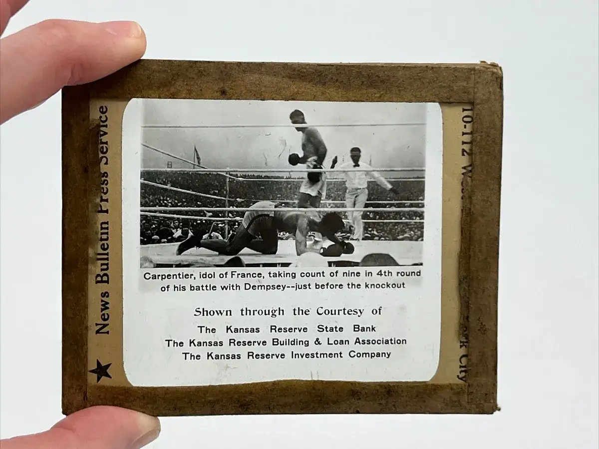 Carpentier takes a count in the 4th round of his battle with Dempsey, a pivotal moment in their historic fight.