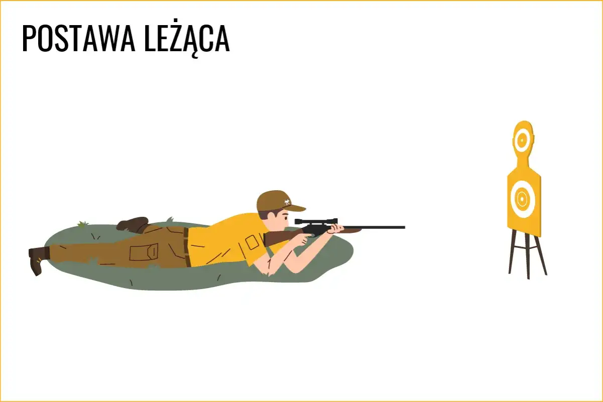 Chłopak w pozycji leżącej ćwiczy, jak strzelać z wiatrówki do tarczy.