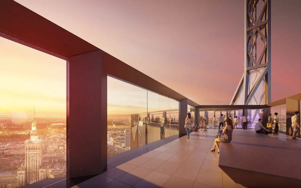 Widok z tarasu widokowego. Ludzie podziwiają panoramę Warszawy o zachodzie słońca. Ile pięter ma Warsaw Tower? To pytanie zadaje sobie wielu.