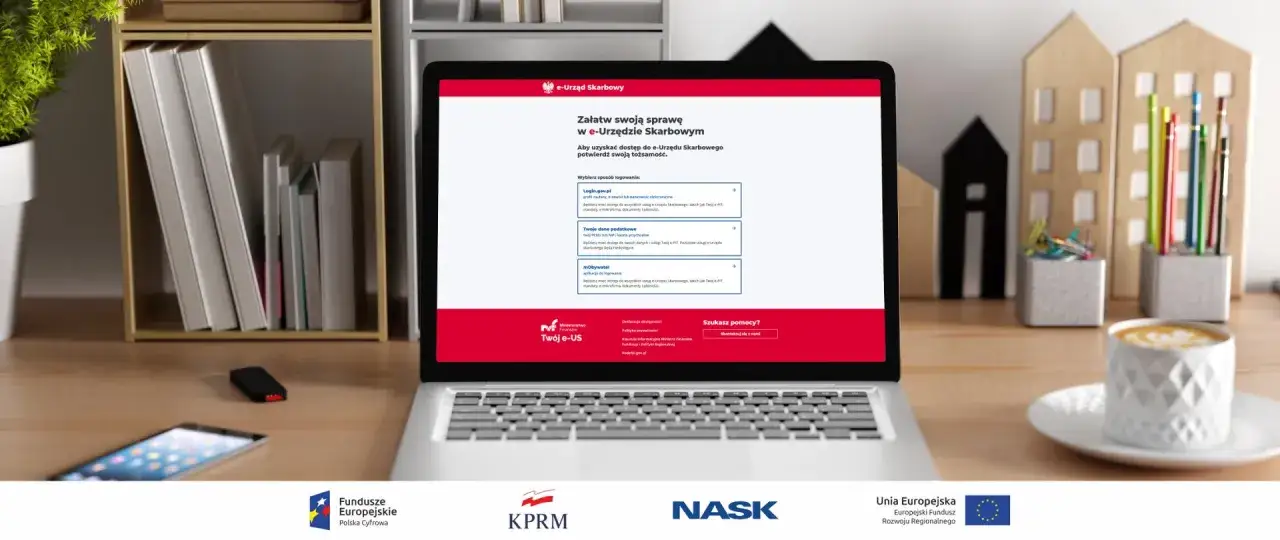 Laptop z otwartą stroną e-Urzędu Skarbowego, gdzie można załatwić sprawy podatkowe i uzyskać dostęp do informacji o dochodach.